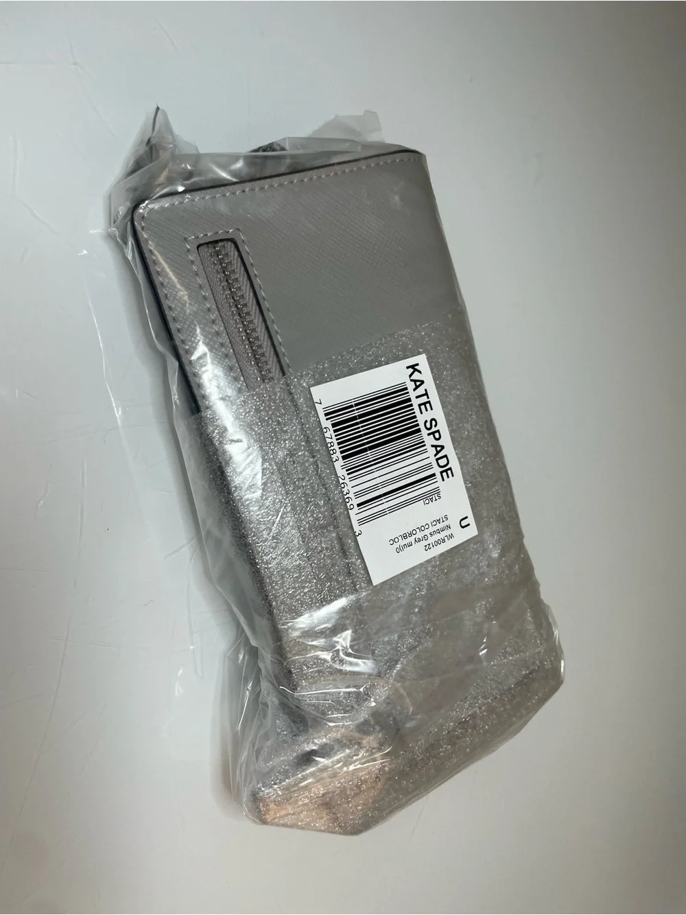 kate spade Two-Tone White and Light Gray Saffiano Zip Wallet with Gold Logo